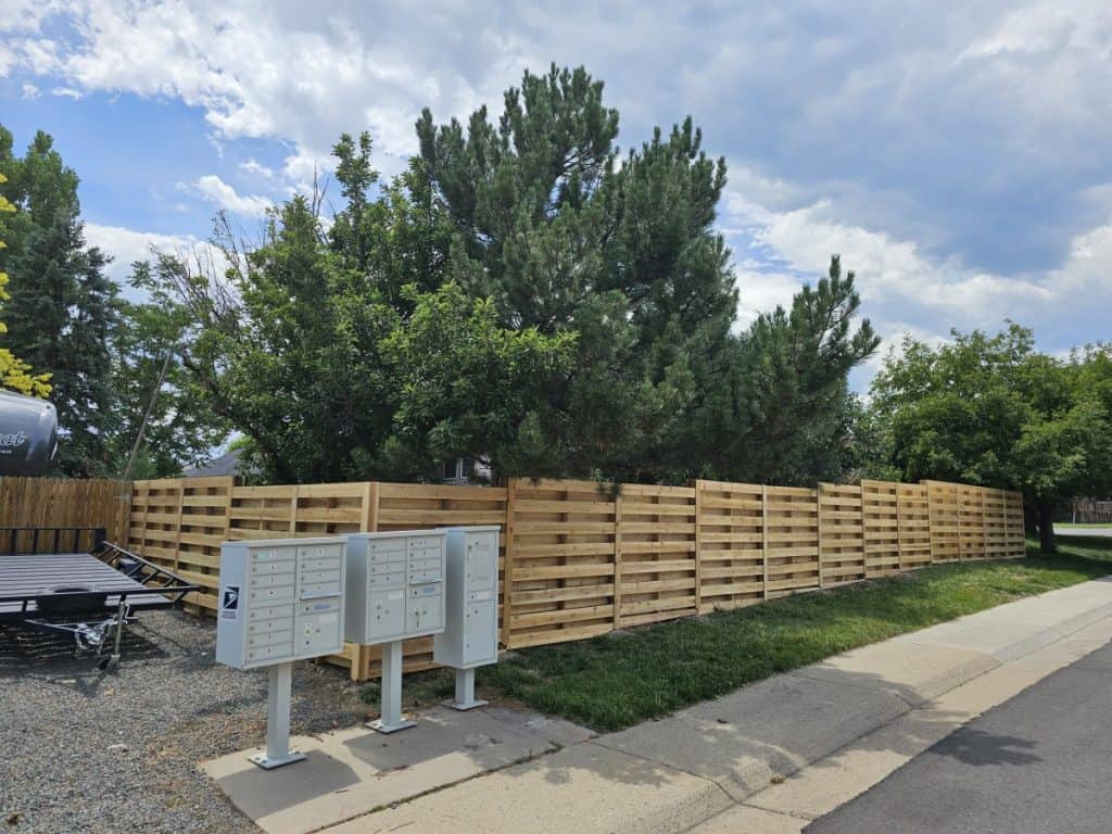 Newly installed decorative privacy wood fence