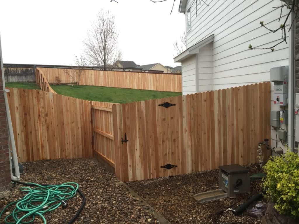 Finished 6 foot privacy fence in a client's backyard