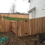 Finished 6 foot privacy fence in a client's backyard
